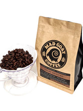 Load image into Gallery viewer, picture of decaf bag and coffee beans